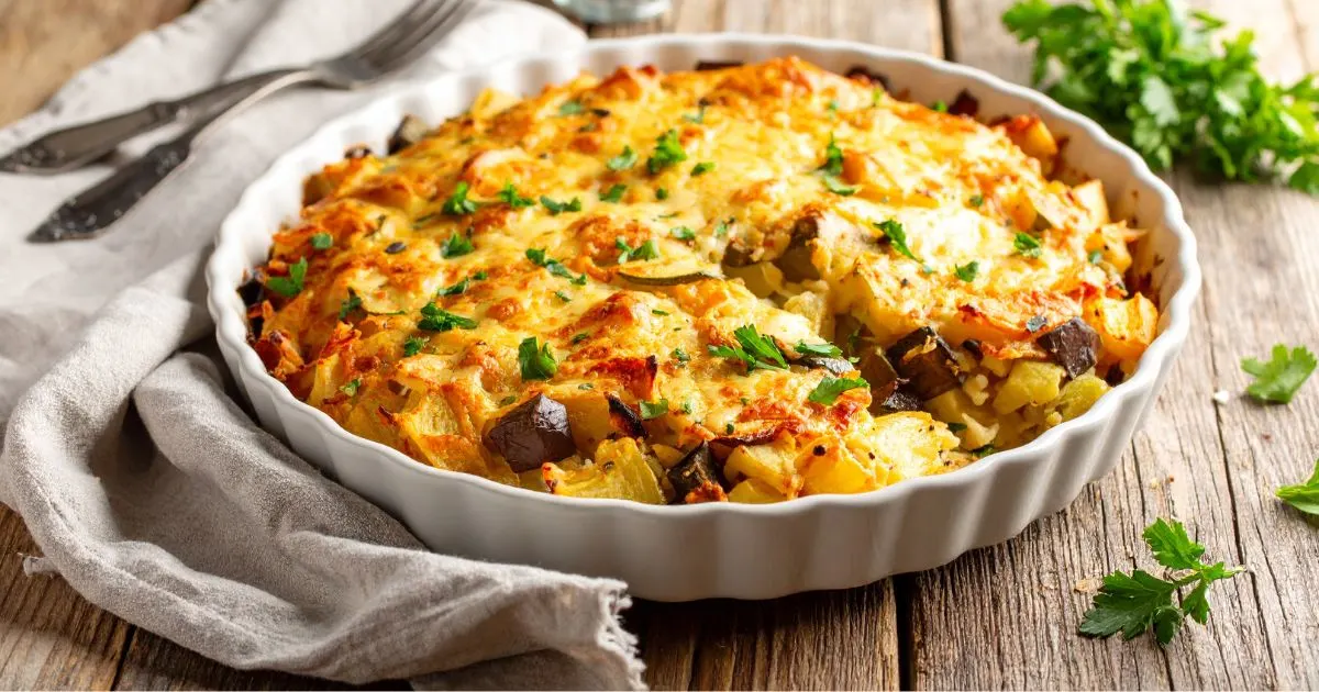 Delicious gluten-free breakfast casserole with eggs, vegetables, and cheese in a baking dish – perfect for a healthy morning meal.