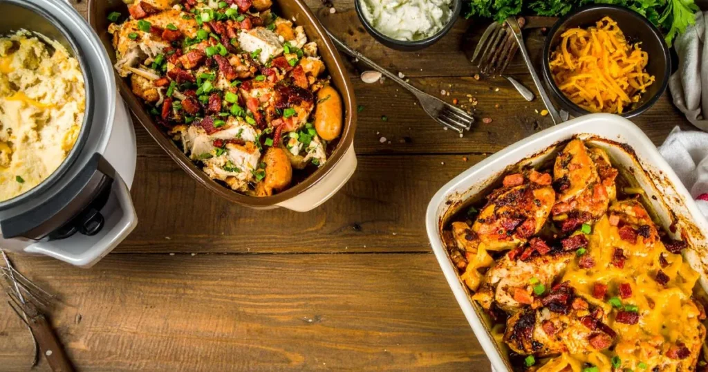 Creamy crack chicken keto topped with crispy bacon and chopped green onions, served in a rustic bowl.